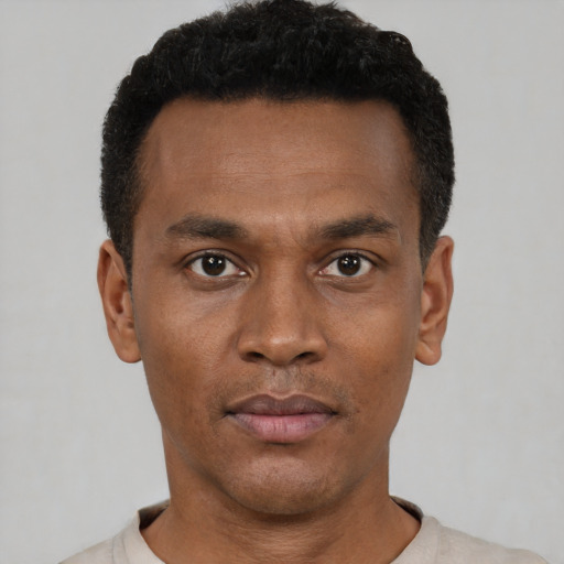 Neutral black young-adult male with short  black hair and brown eyes