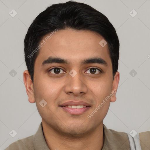 Joyful latino young-adult male with short  black hair and brown eyes