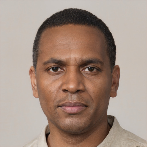 Neutral black adult male with short  black hair and brown eyes