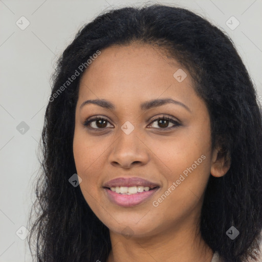 Joyful latino young-adult female with long  black hair and brown eyes