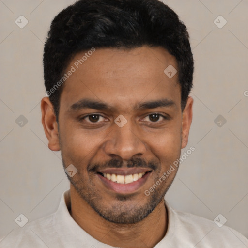 Joyful latino young-adult male with short  black hair and brown eyes