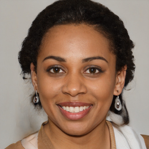 Joyful latino young-adult female with medium  brown hair and brown eyes