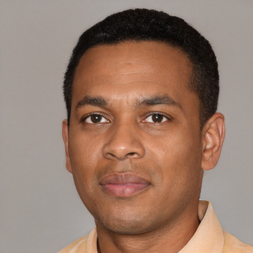 Neutral black young-adult male with short  black hair and brown eyes