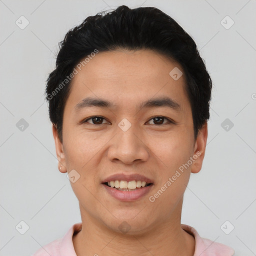 Joyful asian young-adult male with short  black hair and brown eyes