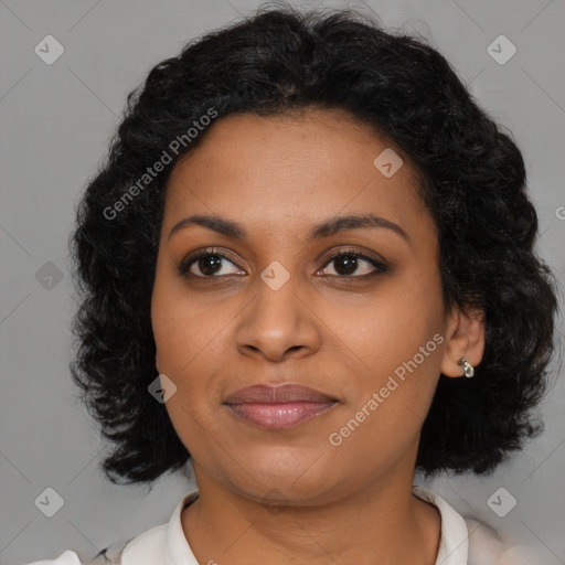 Joyful black young-adult female with medium  brown hair and brown eyes