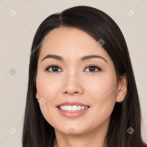 Joyful white young-adult female with long  black hair and brown eyes