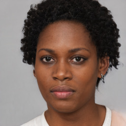 Neutral black young-adult female with short  black hair and brown eyes