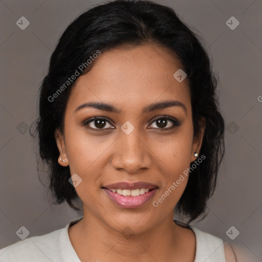 Joyful black young-adult female with medium  brown hair and brown eyes