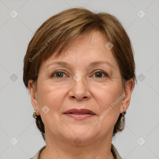 Joyful white adult female with short  brown hair and grey eyes