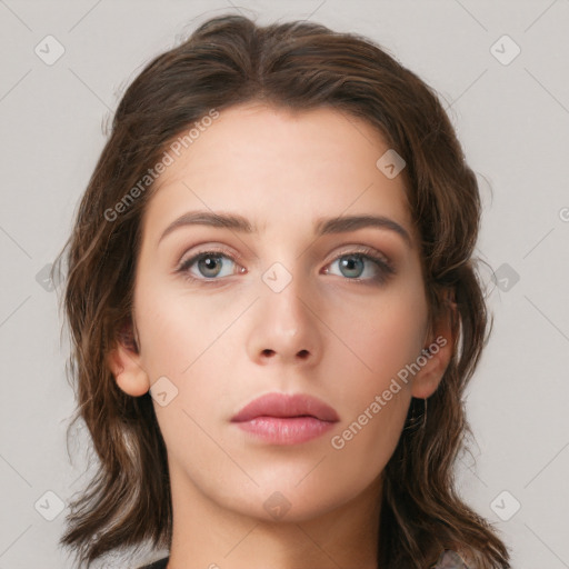 Neutral white young-adult female with long  brown hair and brown eyes