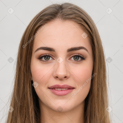 Joyful white young-adult female with long  brown hair and green eyes