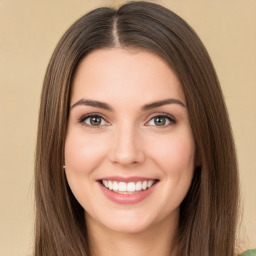 Joyful white young-adult female with long  brown hair and green eyes