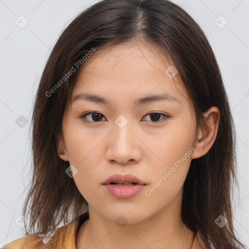 Neutral asian young-adult female with medium  brown hair and brown eyes