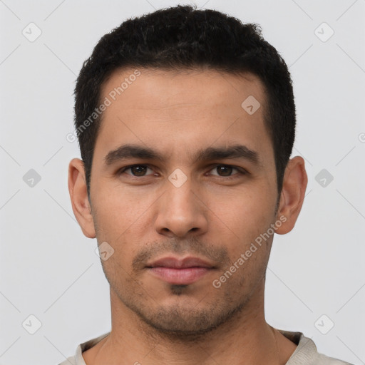 Neutral white young-adult male with short  black hair and brown eyes