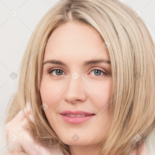 Joyful white young-adult female with medium  brown hair and blue eyes