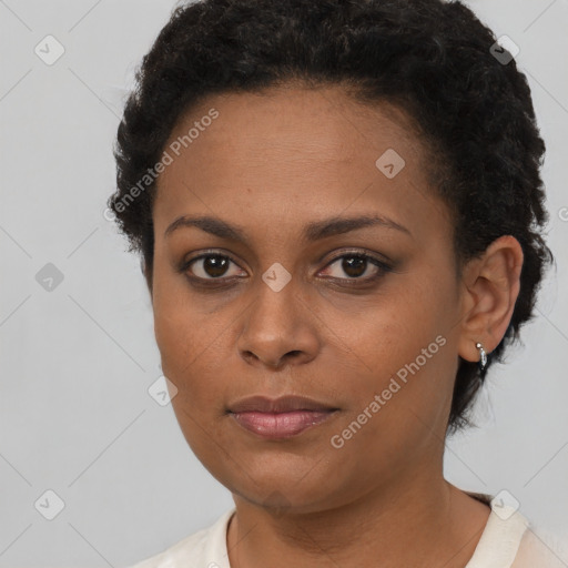 Neutral black young-adult female with short  brown hair and brown eyes