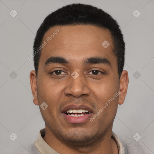 Joyful latino young-adult male with short  black hair and brown eyes