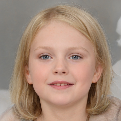 Joyful white child female with medium  brown hair and blue eyes