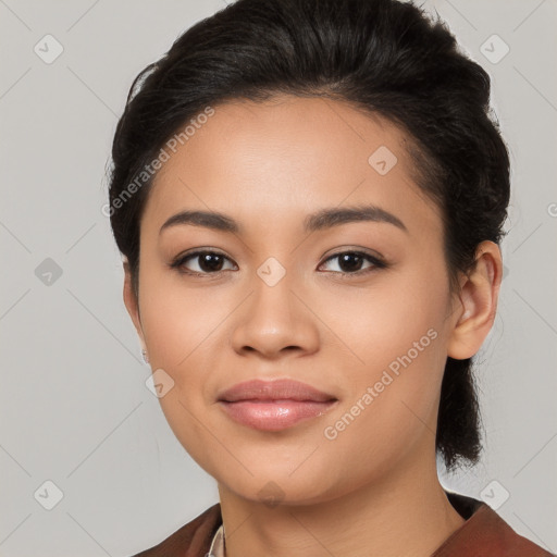 Joyful latino young-adult female with short  black hair and brown eyes