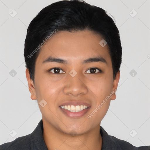 Joyful latino young-adult male with short  black hair and brown eyes