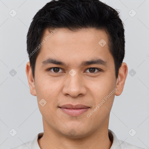 Joyful latino young-adult male with short  brown hair and brown eyes