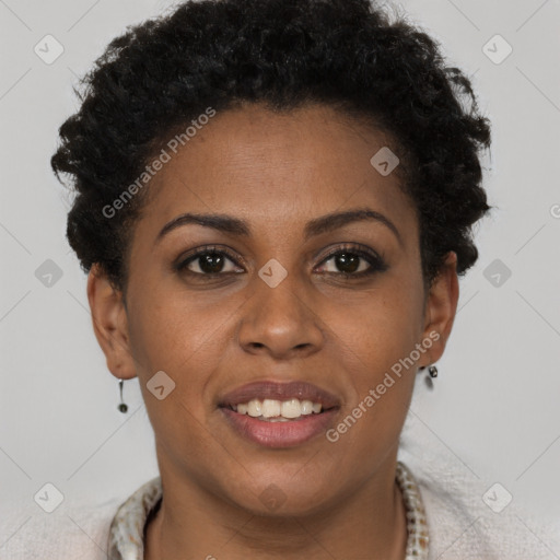 Joyful black young-adult female with short  brown hair and brown eyes