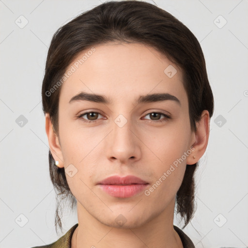 Neutral white young-adult female with medium  brown hair and brown eyes