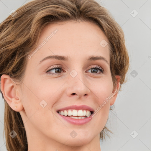 Joyful white young-adult female with medium  brown hair and green eyes