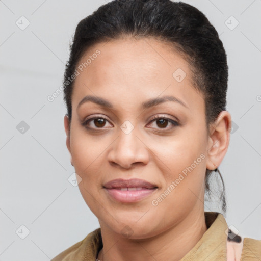 Joyful latino young-adult female with short  brown hair and brown eyes