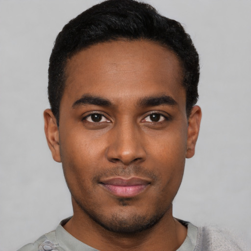 Neutral black young-adult male with short  black hair and brown eyes