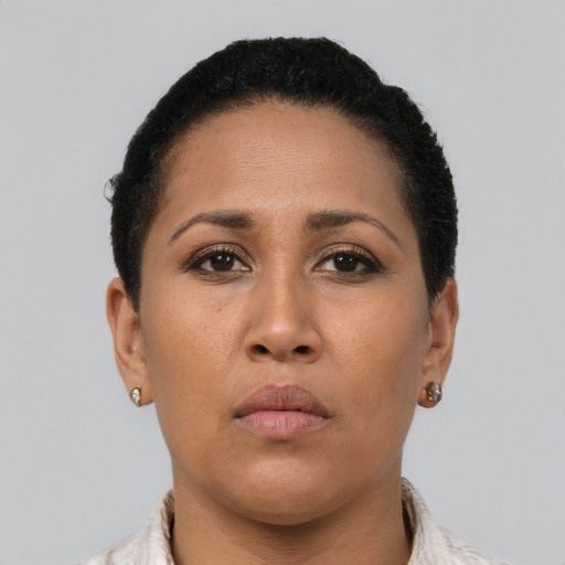 Neutral latino young-adult female with short  brown hair and brown eyes