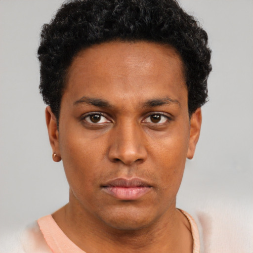 Neutral black young-adult male with short  brown hair and brown eyes