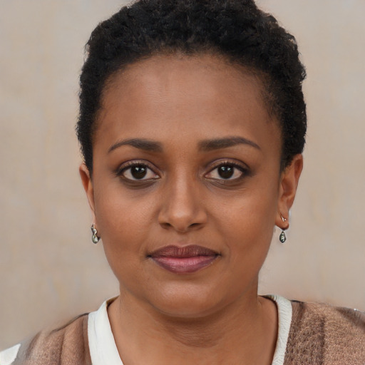 Neutral black young-adult female with short  brown hair and brown eyes