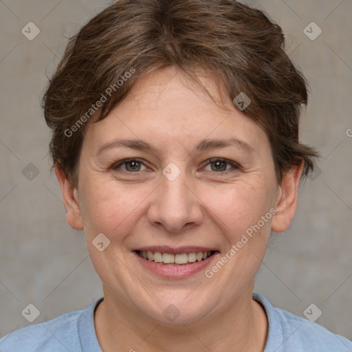 Joyful white adult female with short  brown hair and brown eyes