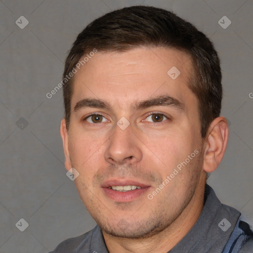 Joyful white adult male with short  brown hair and brown eyes