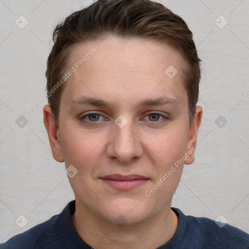 Joyful white young-adult female with short  brown hair and grey eyes