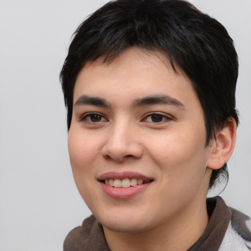 Joyful asian young-adult female with short  brown hair and brown eyes