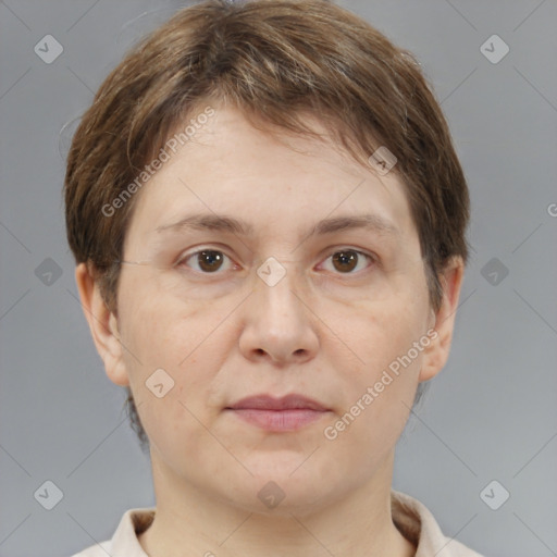 Joyful white adult female with short  brown hair and brown eyes