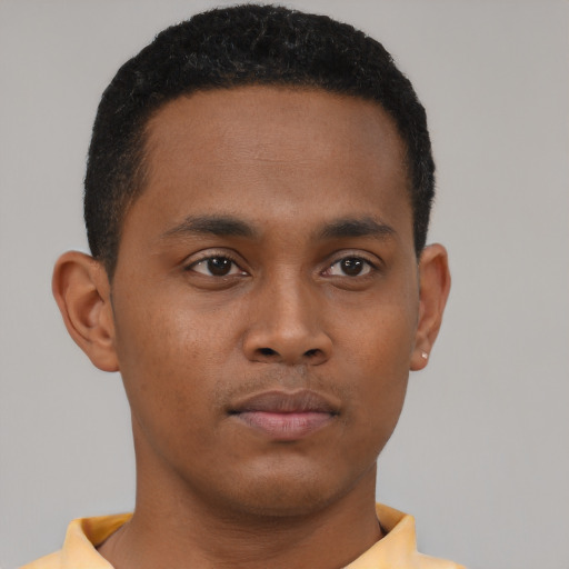 Neutral black young-adult male with short  black hair and brown eyes