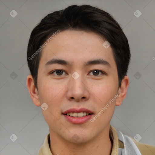 Joyful asian young-adult male with short  brown hair and brown eyes