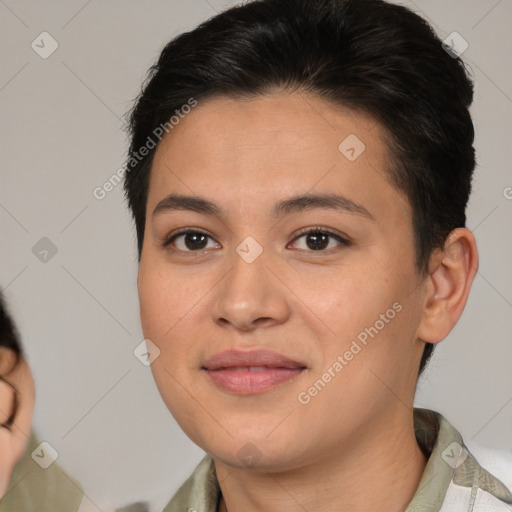 Joyful latino young-adult female with medium  brown hair and brown eyes