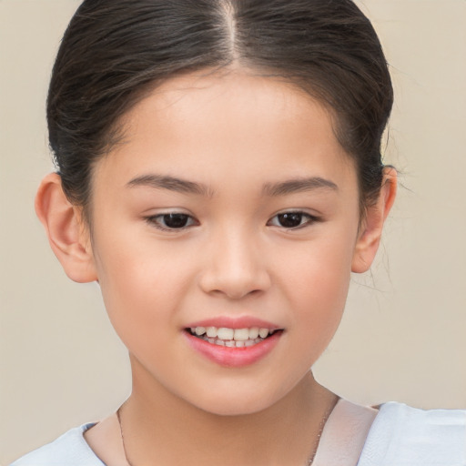 Joyful white child female with short  brown hair and brown eyes