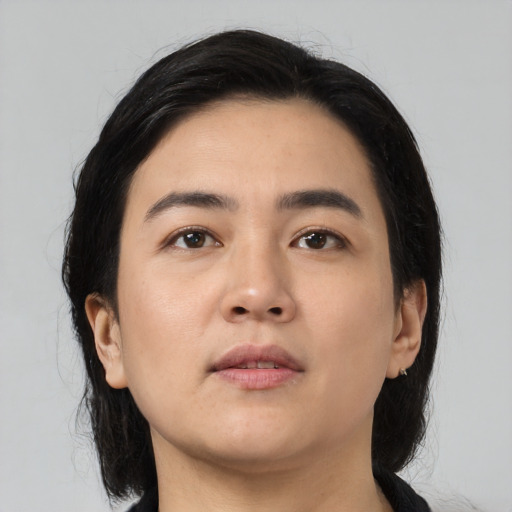 Neutral asian young-adult female with medium  black hair and brown eyes