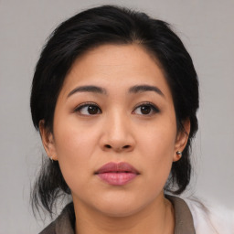 Neutral asian young-adult female with medium  black hair and brown eyes