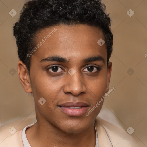 Joyful black young-adult male with short  brown hair and brown eyes