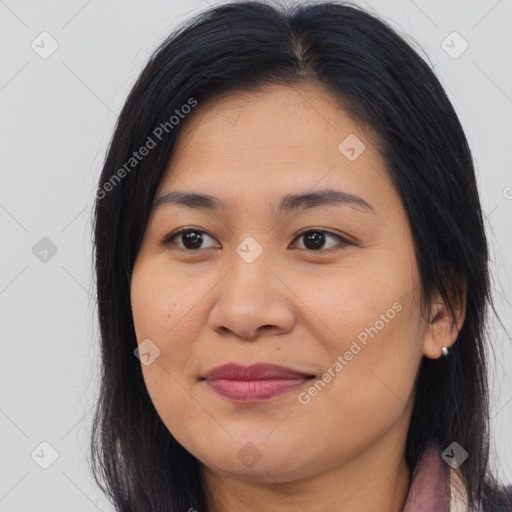 Joyful asian young-adult female with long  brown hair and brown eyes