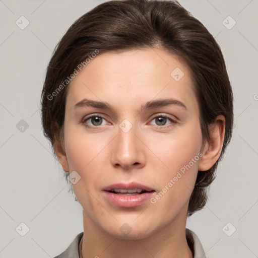 Neutral white young-adult female with medium  brown hair and brown eyes