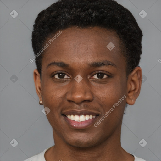 Joyful black young-adult male with short  brown hair and brown eyes