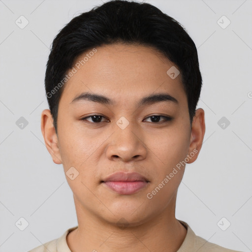 Joyful latino young-adult female with short  black hair and brown eyes