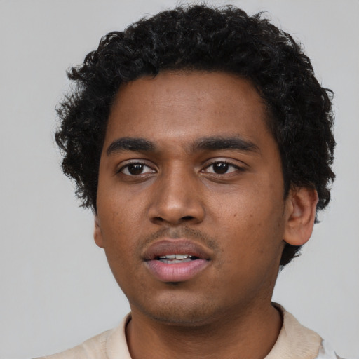 Neutral black young-adult male with short  black hair and brown eyes